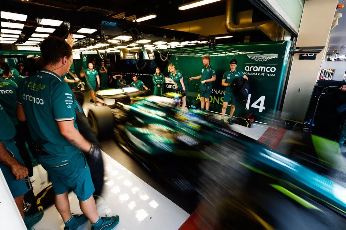 Fernando Alonso, Aston Martin AMR24, leaves the garage