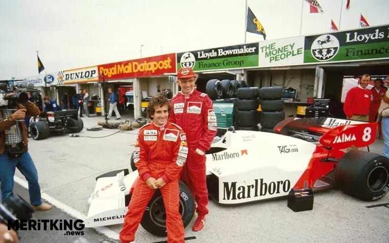 McLaren team-mates Alain Prost and Niki Lauda, pose for a team shot
