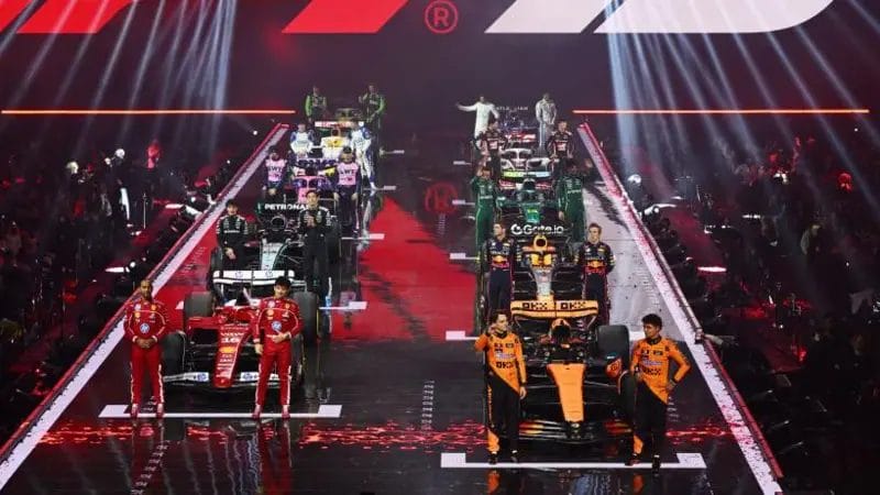 The drivers lined up as if they were on the grid and waved to the fans in the sold-out O2 Arena